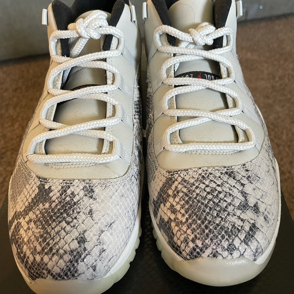 Jordan 11 snake skin. Size 12. Never been worn.